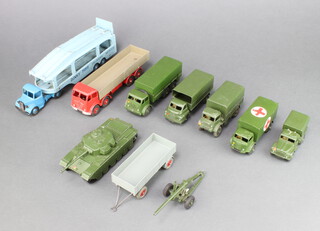 A collection of Dinky Toys including 521 3 ton Army wagon, 522 10 ton Army wagon, 623 Army wagon, 626 Military ambulance, 641 Army 1 ton cargo truck, 651 Centurion tank, 692 5.5 medium gun, 582 pullmore car transporter, 428 trailer and a Dinky Super Toy Foden lorry, 