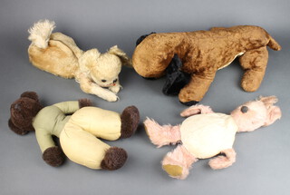 A figure of a dog 35cm, a pyjama case in the form of a dog 41cm, figure of a rabbit and a bear