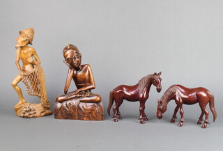 Two Chinese carved hardwood figures of standing horses 16cm x 18cm x 7cm, Burmese carved hardwood figure of a seated gentleman 28cm x 18cm x 9cm, 1 other of a fisherman 34cm x 13cm x 9cm 