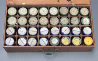 A pine box with hinged lid containing 31 various phonographs comprising 16 Edison Amberol, 12 Edison Blue Amberol, 2 Clarion and 1 Edison Bell gold mounted 
