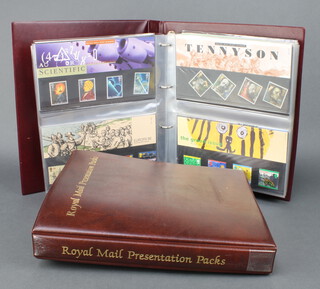 Two albums of GB Elizabeth II mint presentation stamps