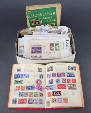 A Royal Mail album of various world stamps including GB, George V and later, Germany France, China, etc, etc together with a collection of loose stamps, first day covers 