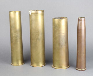 A Continental 90mm brass shell case together with 3 other brass shell cases 