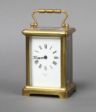 A 19th Century French 8 day carriage timepiece, the white enamelled dial with Roman numerals marked Searel and Co. 79 Lombard Street, London, complete with key  
