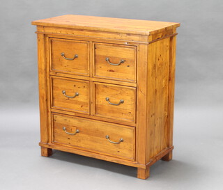 A hardwood chest of 4 short and 1 long drawer with brass swan neck drop handles, raised on square supports 98cm h x 90cm w x 45cm d 
