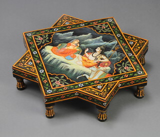 A hardwood diamond shaped painted occasional table decorated 2 figures and sacred cow 13cm x 65cm x 65cm 