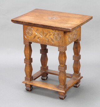 A rectangular carved oak occasional table with hinged lid, raised on square shaped supports with box framed stretcher 70cm h x 60cm w x 42cm d  
