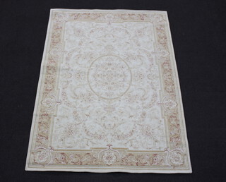 A yellow floral patterned Aubusson style rug 193cm x 137cm 