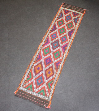 A red, turquoise and white ground Suzni Kilim runner 271cm x 67cm 