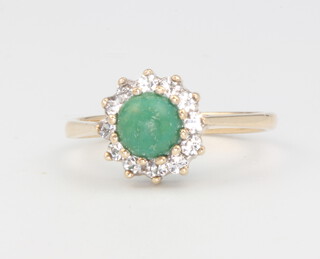 A 9ct yellow gold jade cluster ring, size N, 2.4 grams