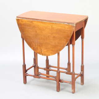 A 19th Century mahogany oval drop flap gateleg spiderleg table, 67cm h x 61cm w x 27cm 