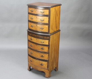 A Georgian style cross banded mahogany bow front chest on chest, the upper section fitted 3 short drawers, the base a brushing slide and 4 long drawers, raised on bracket feet 117cm h x 45cm w x 33cm d  