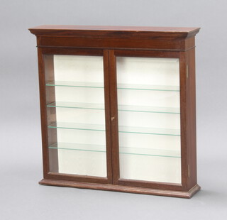 A 19th Century style mahogany display cabinet with moulded cornice and shelved interior enclosed by bevelled panelled doors 70cm h x 73cm w x 15cm d 