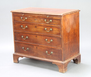 A Georgian crossbanded mahogany chest with brushing slide above 4 long graduated drawers, raised on bracket feet 84cm h x 94cm w x 50cm d 
