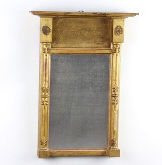 A Regency rectangular plate pier mirror contained in a decorative gilt frame supported by pillars 52cm h x 37cm w x 9cm d 