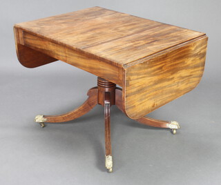 A George III mahogany pedestal sofa table fitted 2 frieze drawers, raised on a turned column and tripod base ending in brass caps and castors 67cm h x 91cm w x 67cm 