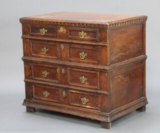 An 18th Century Continental oak chest of 4 drawers with geometric mouldings, raised on square supports 81cm h x 90cm w x 58cm d 