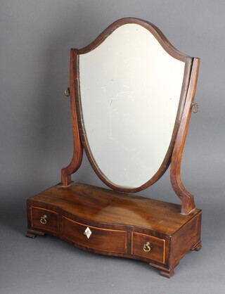 A 19th Century shield shaped dressing table mirror contained in a mahogany frame, base of serpentine outline fitted 1 long and 2 short drawers raised on bracket feet 58cm h x 43cm w x 20cm d 