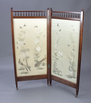 A Victorian walnut 2 fold screen with bobbin turned decoration and silk panels decorated birds 150cm h x 64cm when closed x 129cm when open 