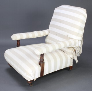 Maple & Co, a Victorian open arm chair, part upholstered in white material 