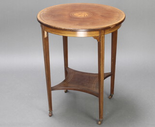 An Edwardian circular inlaid mahogany occasional table, raised on square tapered supports with shaped undertier 74cm h x 60cm diam.  