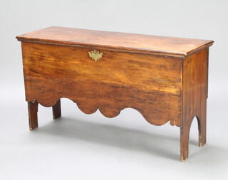 An 18th/19th Century elm coffer of panelled construction with hinged lid, fitted a candle box to the interior 60cm h x 111cm w x 37cm d 