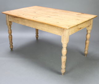 A Victorian rectangular pine kitchen table, raised on turned supports 75cm h x 139cm l x 88cm w 