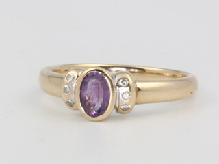 A 9ct yellow gold amethyst and diamond ring size, 3 grams, size O 1/2