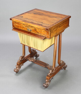 A William IV rosewood games/work table, the sliding top inlaid a chessboard, the interior fitted a plush backgammon board above 1 long drawer with deep basket, raised on turned columns with H framed stretcher and scroll feet 74cm h x 50cm w x 45cm d 
  