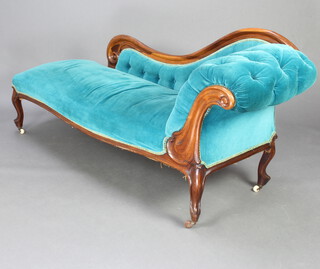 A Victorian rosewood show frame chaise longue upholstered in blue material, raised on cabriole supports 80cm h x 179cm w x 61cm d 