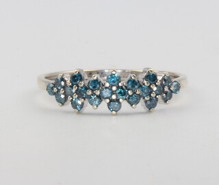 A 10ct white gold blue diamond ring, 1.6 grams, size P