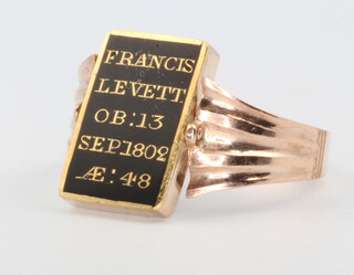 A 9ct yellow gold 19th Century enamelled in memorial ring "Frances Levett OB.13 Sep 1802 AE 48" with swivel stone mount 4.2 grams, size N 