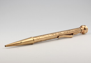 A 9ct yellow gold engine turned propelling pencil, gross 15.4 grams 