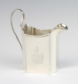 A George III silver cream jug with chased armorial, London 1793, 12cm, 184 grams