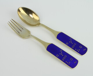 A Danish silver and blue enamelled Christmas fork and spoon, dated 1964 by A Michelsen  