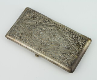 An Indian repousse silver rectangular silver cigarette case 142 grams, stamped 800