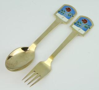 A Danish silver gilt and enamelled spoon and fork by A Michaelson 94 grams, dated July 1977 