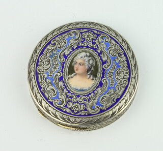 An 800 standard enamelled circular compact decorated with a portrait of a lady 70 grams gross, 6cm  