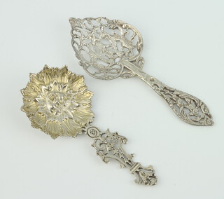 A Continental pierced silver spoon with mask bowl and pierced handle, a ditto sifter spoon, 54 grams 