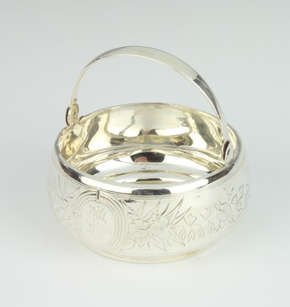 A Russian silver swing handled basket with chased floral decoration and monogram 109 grams