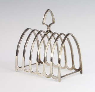 A silver 7 bar arched toast rack Birmingham 1927, 147 grams, 11cm