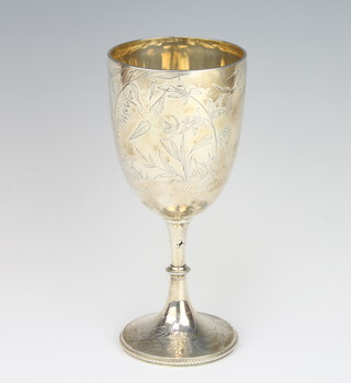 A Victorian silver goblet decorated with birds and flowers London 1879, 19cm, 207 grams 