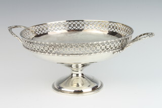 A silver bowl with pierced border and fancy handle, Birmingham 1919, 30cm, 559 grams