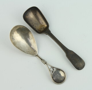 A stylish silver caddy spoon London 1990 and a Georgian ditto 59 grams