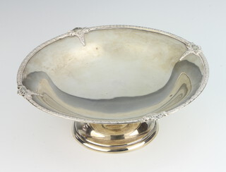 A silver pedestal bowl with geometric rim Birmingham 1925, 23cm, 440 grams 