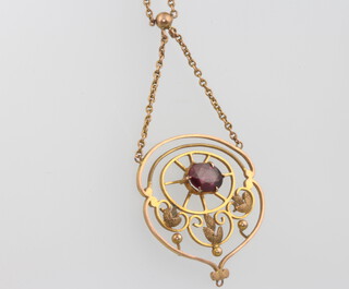 A 9ct yellow gold garnet pendant and chain 4.1 grams