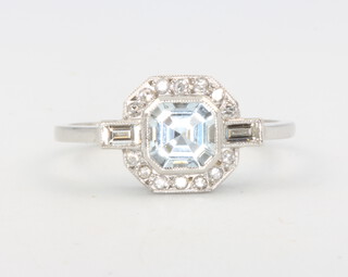 A platinum aquamarine and diamond Art Deco style ring, aquamarine approx. 0.7ct the diamonds 0.3ct, size P, 4.2 grams 
