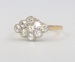 An 18ct yellow gold diamond cluster ring size M, 2.7 grams 