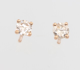 A pair of 18ct rose gold diamond ear studs, approx. 0.5ct