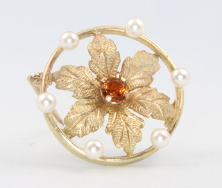 A 9ct yellow gold gem and pearl floral brooch 4.4 grams 
